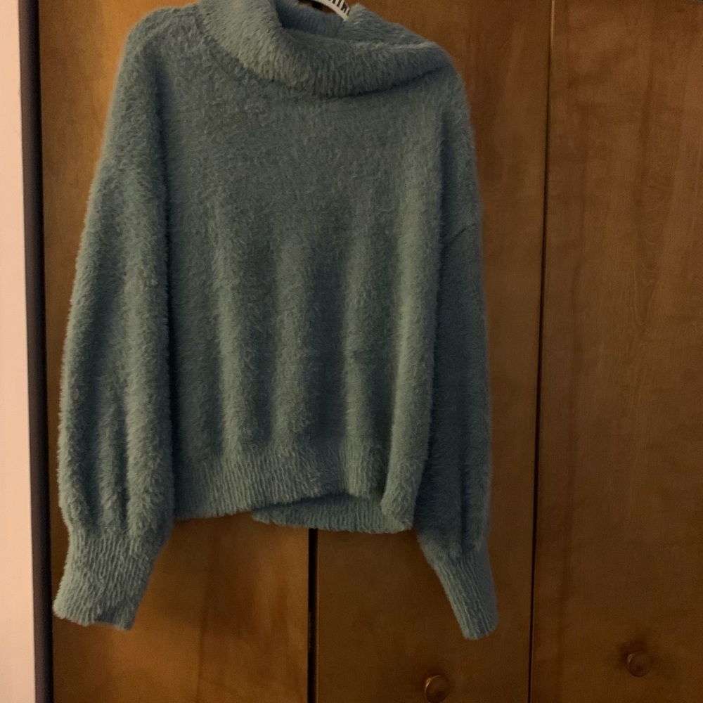 Blue fuzzy sweater. So soft